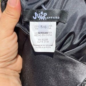 Prom dress black and white size 6 . Worn once, cleaned , in good shape.